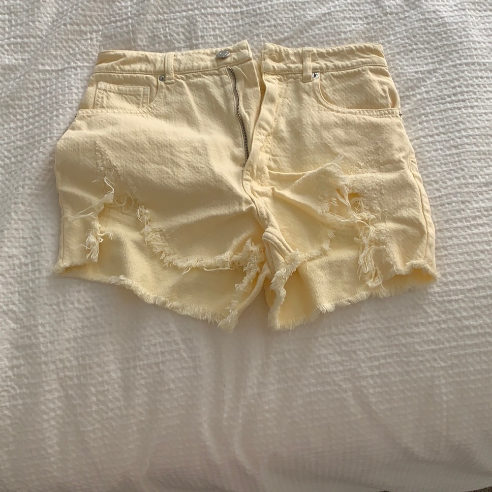 Yellow denim shorts